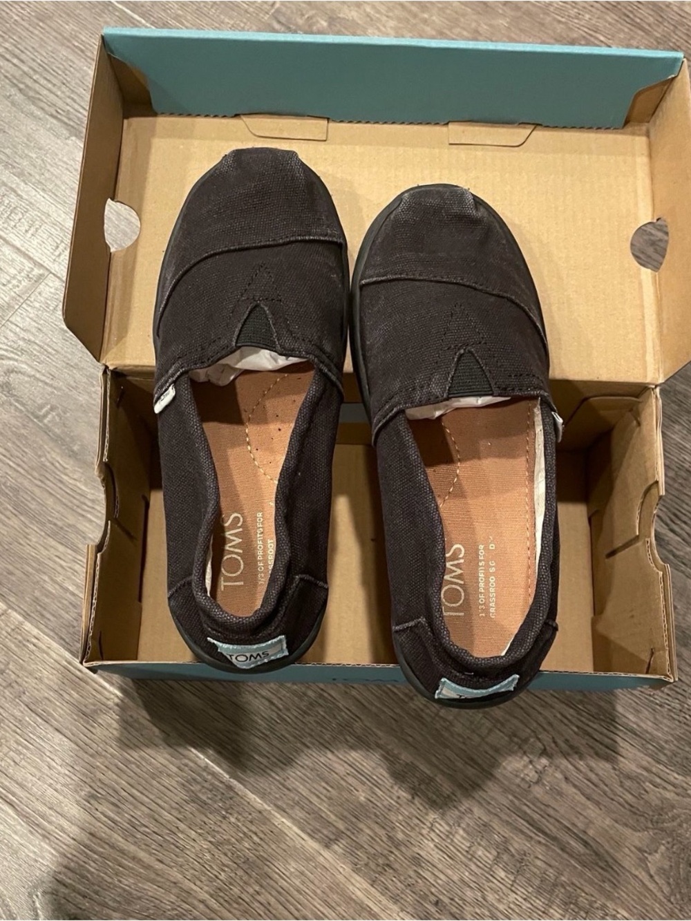 TOMS girls Classic Canvas Slip-On Shoes in Black